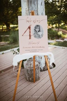 a wooden easel with a sign that says, for who's welcome to