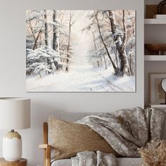 a living room filled with furniture and a painting on the wall