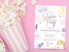 a pink and white striped cup with popcorn on it next to a card that says summer party