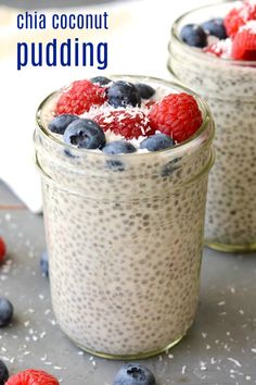 two jars filled with chia pudding and berries