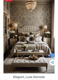 a bed room with a neatly made bed and a chandelier