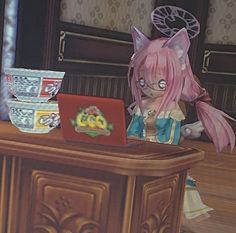 an anime character sitting at a desk with a laptop computer in front of her,