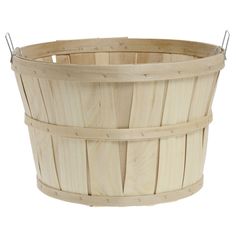 a round wooden basket with metal handles on an isolated white background for use as a planter