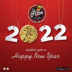 a happy new year card with pizza hanging from strings