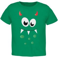 a green t - shirt with an image of a monster's face on it