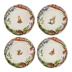 four plates with animals on them are shown