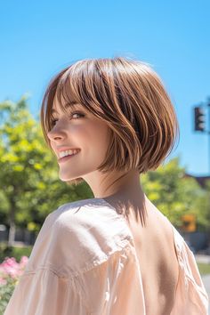 Discover the perfect short hairstyle women with this chic, layered bob designed specifically for a round face. This elegant cut enhances your facial features, providing a youthful and stylish look. The subtle waves add texture and movement, giving you a modern edge while keeping things sophisticated. It's an effortless choice for those wanting to embrace their natural beauty. Transform your look today with this stunning hairstyle! #shorthairstylewomen #RoundFace Short Hairstyle Women, Cottagecore Outfits, Hair Accessories Collection, Hair Color For Women, Hairstyle Women, Layered Bob, Short Hairstyle, Facial Features, Wooden Sculpture