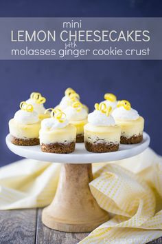 mini lemon cheesecakes with molasses ginger cookie crust on a cake plate