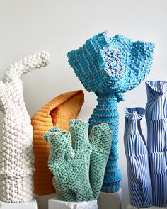 three crocheted vases sitting next to each other