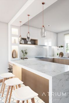 a kitchen with marble counter tops and stools in front of an island that's surrounded by hanging lights