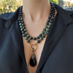 Kambaba jasper and onyx layered necklace with pendant. Chunky statement natural gemstone beaded necklace for women. Large green black handmade necklace with big bead and gemstone. Big bold bohemian bright necklace in gold color are suitable for an casual look, evening look and for a holiday. These necklace will be a good Mothers day, anniversary, wedding or birthday gift for women, mom, wife, girlfriend, sister or daughter. Women's necklace with natural stone. It emphasizes the beauty of your ne Big Beaded Necklace, Statement Gemstone Necklace, Bright Necklace, Large Bead Necklace, Jasper Necklace, Gemstone Beaded Necklace, Onyx Necklace, Black Necklace, Green Necklace