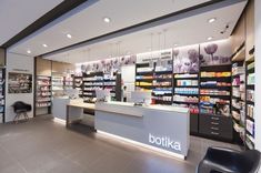 the inside of a store with shelves full of products