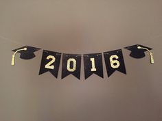 a graduation banner with the year 2016 hanging from it