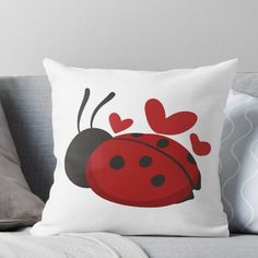 a ladybug with hearts on it's back throw pillow