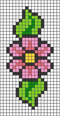 a cross stitch pattern with pink and green flowers in the center, on a black background