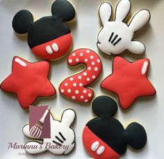 mickey mouse cookies are arranged in the shape of numbers