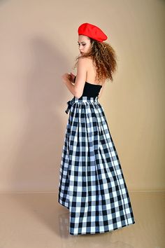 "This beautiful 80s black and white checkered skirt is made out of high quality soft cotton fabric. It is high waisted and has a separate 2,5m (8ft) long belt, made of the same fabric as the skirt and a hidden zipper on the side. You can tie the belt into a bowtie or however else you want. Pockets can be sewn in if you want to. Perfect for any day, that is special to you. Care: hand wash and hang dry Available Size: XS, S, M, L, XL, 2XL, 3XL, 4XL, 5XL, 6XL, 7XL, 8XL The model wears size M - 5,7' Gingham Cotton Skirt, Plaid Cotton Long Skirt, Plaid Long Cotton Skirt, Long Plaid Cotton Skirt, Plaid Cotton Flared Skirt, Cotton Gingham Skirt, Cotton Plaid Flared Skirt, Gingham Gathered Cotton Skirt, Retro Gingham Cotton Skirt