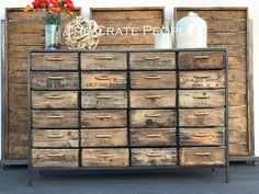 an old wooden dresser with many drawers