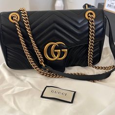 Gucci Gg Marmont Small Shoulder Bag, Black Leather, Only Been Carried Handful Of Times. I Don’t Have The Box For It Only The Duster. No Scratches. 100% Authentic Gucci Rectangular Bag With Gold-tone Logo Plaque, Gucci Rectangular Shoulder Bag With Gold-tone Logo, Gucci Gold Bag With Gold-tone Logo Plaque, Classic Gucci Bags With Gold-tone Logo Plaque, Luxury Gucci Bag With Gold-tone Logo Plaque, Elegant Gucci Bag With Gold-tone Logo Plaque, Elegant Black Shoulder Bag With Gold-tone Logo, Gold Gucci Bag For Formal Occasions, Designer Shoulder Bag With Gold-tone Logo Plaque