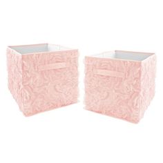 two pink storage boxes with bows on the top and bottom, one is made out of fabric