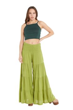 Cropped top, solid color, cute and elegant. Made of resistant and breathable material, it has adjustable straps and a V-shaped transparency on the front, a detail that adds style to your look. Available in sizes S/MM/L and in dark green, black, teal blue, ocher yellow and pistachio green. Material:95% viscose 5% elastane Designed and produced by Baba Design Palazzo Trousers, Pistachio Green, Flare Trousers, Color Shorts, Yellow Black, Fashion Wear, Teal Blue, V Shape, Brunei