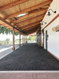 the inside of a building that has a lot of wood and white siding on it