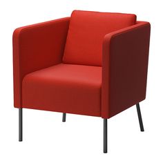 a red chair sitting on top of a white floor next to a black metal frame