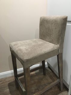 a chair sitting on top of a hard wood floor