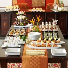 a buffet table filled with lots of food