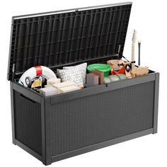 an open trunk filled with assorted items on top of a white background and the lid opened