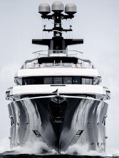 a large white boat in the middle of the ocean