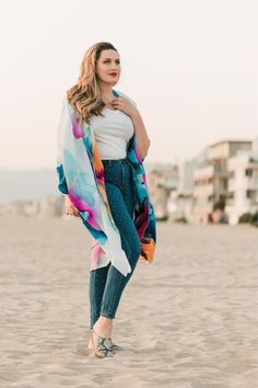 Layer up this spring with this elegant floral print lightweight cape. This versatile design is great for layering over a casual outfit or for a cute date night look. Shop this women’s cape now in the byVINNIK shop. Spring fashion outfit | summer outfit | plus size fashion | midsize fashion | swimsuit coverup