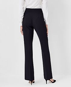 Elevate your wardrobe with the Ann Taylor Petite Side Zip Trouser Pant in Fluid Crepe, tailored to enhance and flatter your curves. These pants are a perfect blend of sophistication and comfort, designed specifically for the petite, curvy woman.

- **Size:** Petite 00
- **Color:** Black
- **Material:** 95% Polyester, 5% Spandex
- **Fit:** Curvy, tailored fit
- **Leg Shape:** Trouser with a slight flare to elongate the legs
- **Rise:** High rise, sitting just below the natural waist
- **Length:** Elegant Non-stretch Black Dress Pants, Black Non-stretch Straight Leg Dress Pants, Black 4-way Stretch Ankle-length Dress Pants, Black Tapered Leg Pants With 4-way Stretch, Black Pants With 4-way Stretch And 5-inch Inseam, Petite Curvy, Knitted Suit, Side Zip, Trouser Pants