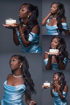 a woman in blue dress holding a cake with candles on it and blowing out the candles