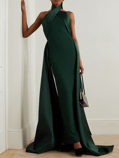 EXCLUSIVE AT NET-A-PORTER. The dramatic silhouette of Solace London's 'Rumi' gown will ensure you'll make a memorable entrance. It's cut from stretch-crepe to hug your figure with glossy satin-twill that wraps around the neck and waist before falling at the sides to an asymmetric hem. Style yours with glittering earrings and elbow-length velvet gloves. Creative Black Tie, London Outfit, Halter Gown, Black Tie Dress, Ladies Of London, Elegant Party