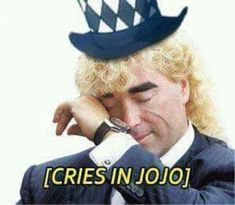 a man in a suit with a hat on his head and the caption cries in jojoj