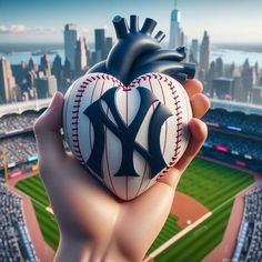 a heart shaped baseball with the new york yankees on it in front of a stadium