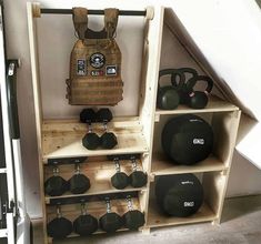 the gym equipment is neatly organized and ready to be put into use in the home