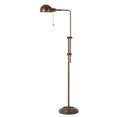 a floor lamp with an adjustable arm and a metal shade on the top, standing in front of a white background