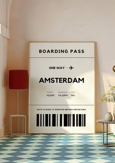 a boarding pass sitting on top of a wall next to a table with a lamp