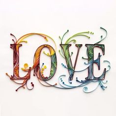 the word love is made up of colorful swirls