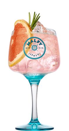 a pink cocktail with orange slices and rosemary garnish in a wine goblet