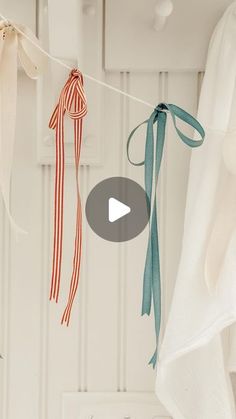 some ribbons hanging from a clothes line