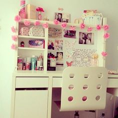 a white desk with pink flowers on it