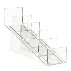 three clear acrylic shelves with dividers on each side