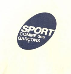 a white t - shirt with the words sport comme des garons on it