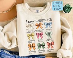 I Am Thankful For Sweatshirt, Christian Sweatshirt, Thankful Bow Sweatshirt, Fall Coquette Bow Shirt, Thanksgiving Hoodie, Thanksgiving Gift ⭐ HOW TO ORDER ⭐ 1️⃣ Please check all the photos in the listing. 2️⃣ Choose your shirt size and color. (Please check listing photos for these) 3️⃣ In the personalization box, please enter your Text, Text Color, Text Style. 4️⃣ Click "Add to Cart". You can go back to the listing and follow the same steps to add more products. 5️⃣ Click "Proceed to Checkout". Christian Pumpkin, Embroidery Christian, Thankful Pumpkin, Christian Halloween, Fall Coquette, Halloween Coquette, Fall Embroidery, Fur Sweatshirt, Coquette Bow Png