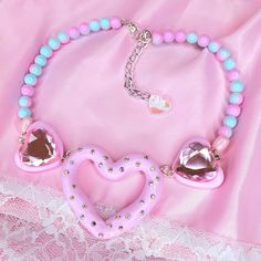 Was £38 ~ Now £30  The Polly Pocket inspired necklace featuring 3 clay heart charms embellished with iridescent crystals and pink crystal gems ~ on an ombre pink and blue beaded necklace  Length 34cm, Extender 6cm Main hollow heart charm size 6 x 5.5cm Hand-made with love in the UK Polymer Clay Kawaii Necklaces, Baby Cakes Kawaii Cottage Core Necklaces, Yami Kawaii Necklaces, Polly Pocket Necklace, Pink Kawaii Jewelry For Valentine's Day, Kawaii Pink Jewelry For Valentine's Day, Cute Heart Charm Party Jewelry, Cute Heart Charm Jewelry For Parties, Cute Party Jewelry With Heart Charm