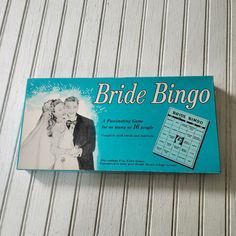 a bride and groom calendar sitting on top of a table