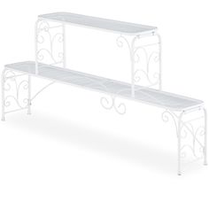 two white metal benches sitting next to each other on a white background with swirl designs